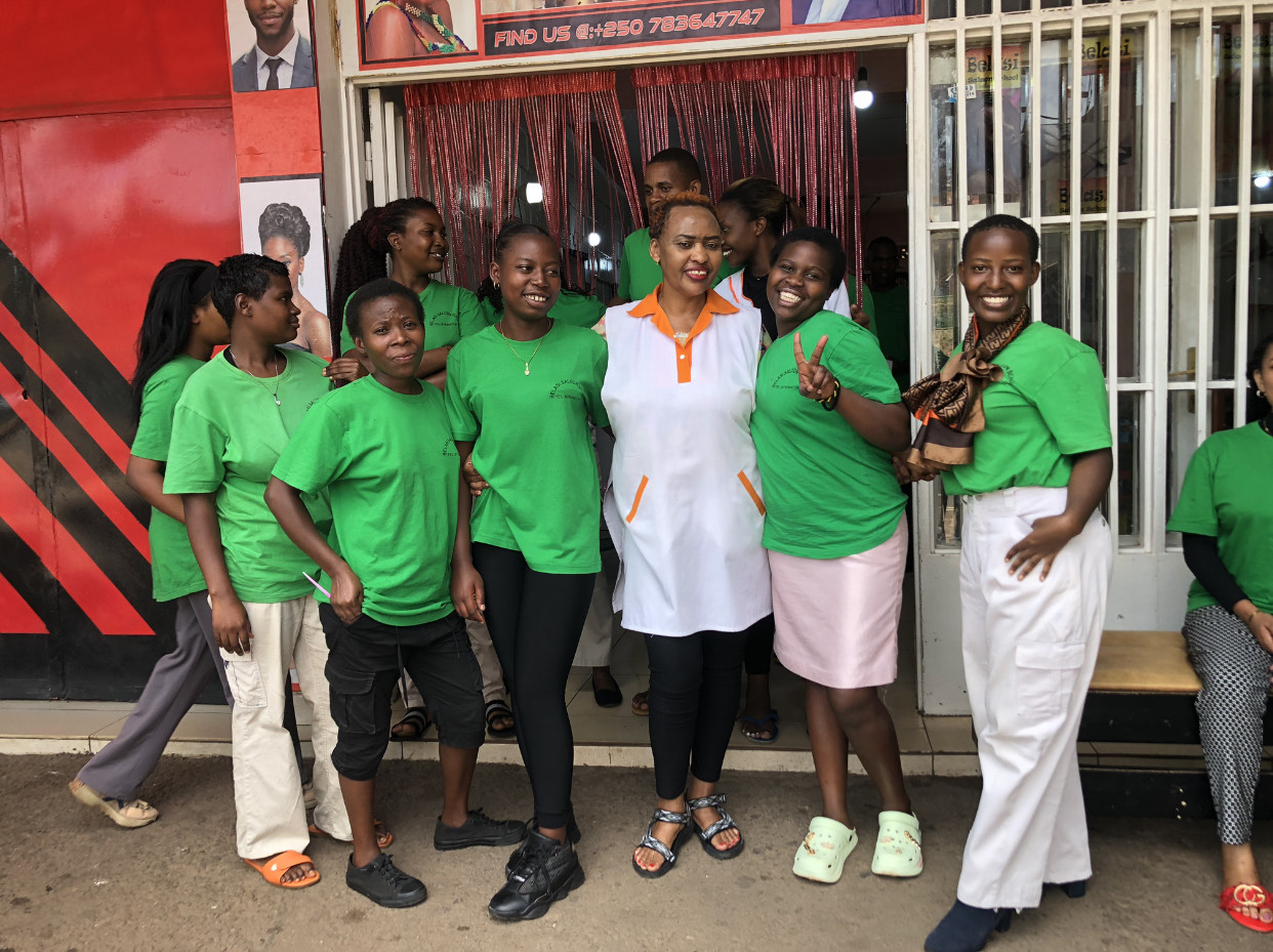 Students and teacher at Belasi Saloon School Rwanda learning and practicing beauty and TVET skills under the guidance of Epiphanie MUKAYIRANGA.