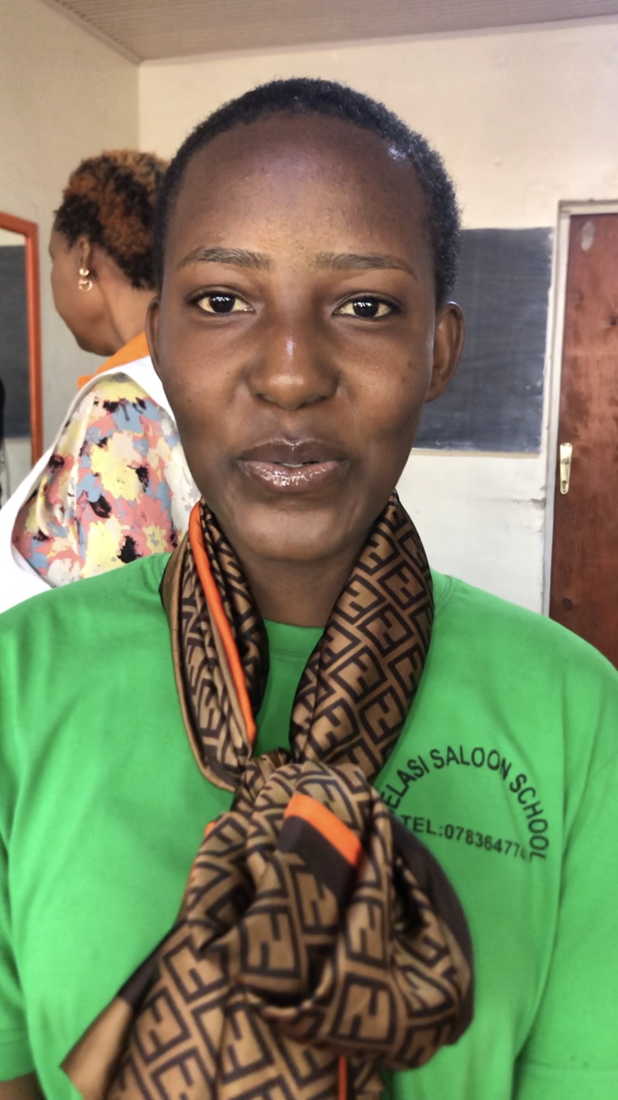 Students and teacher at Belasi Saloon School Rwanda learning and practicing beauty and TVET skills under the guidance of Epiphanie MUKAYIRANGA.