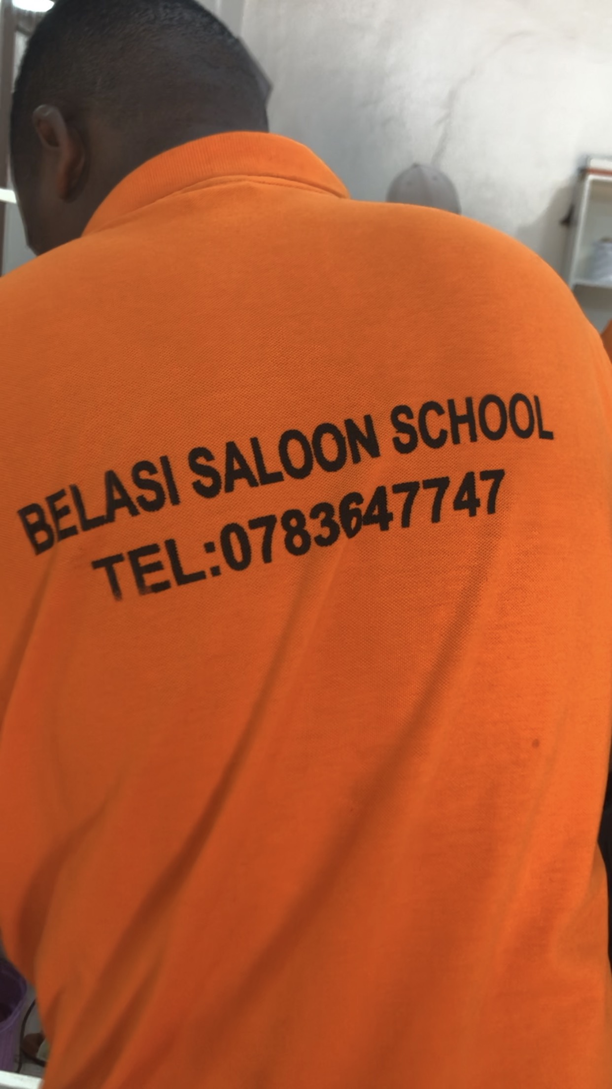 Students and teacher at Belasi Saloon School Rwanda learning and practicing beauty and TVET skills under the guidance of Epiphanie MUKAYIRANGA.
