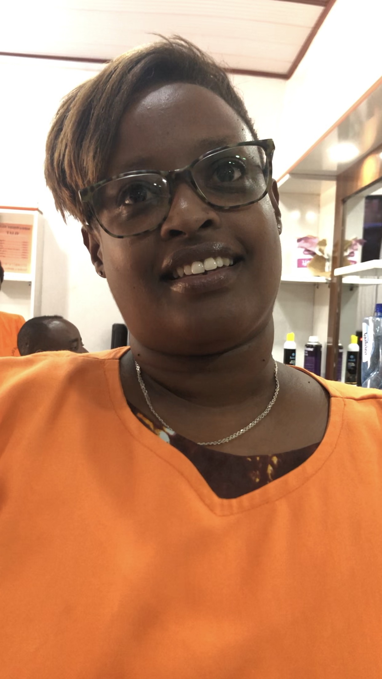 Students and teacher at Belasi Saloon School Rwanda learning and practicing beauty and TVET skills under the guidance of Epiphanie MUKAYIRANGA.